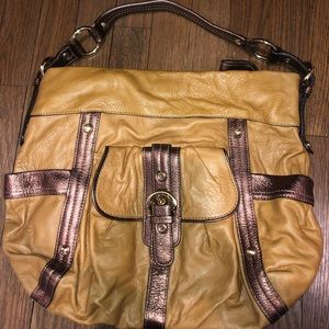 B. Makowsky gold and yellow pocketbook